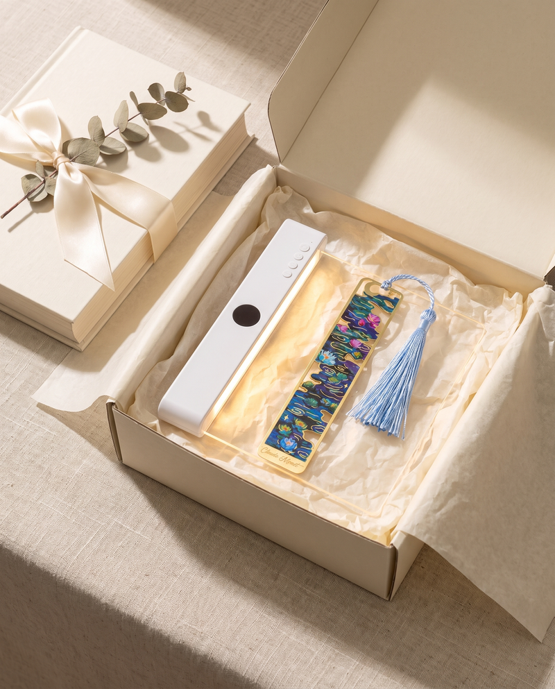 Gift box with a PageGlow book light and a brass bookmark