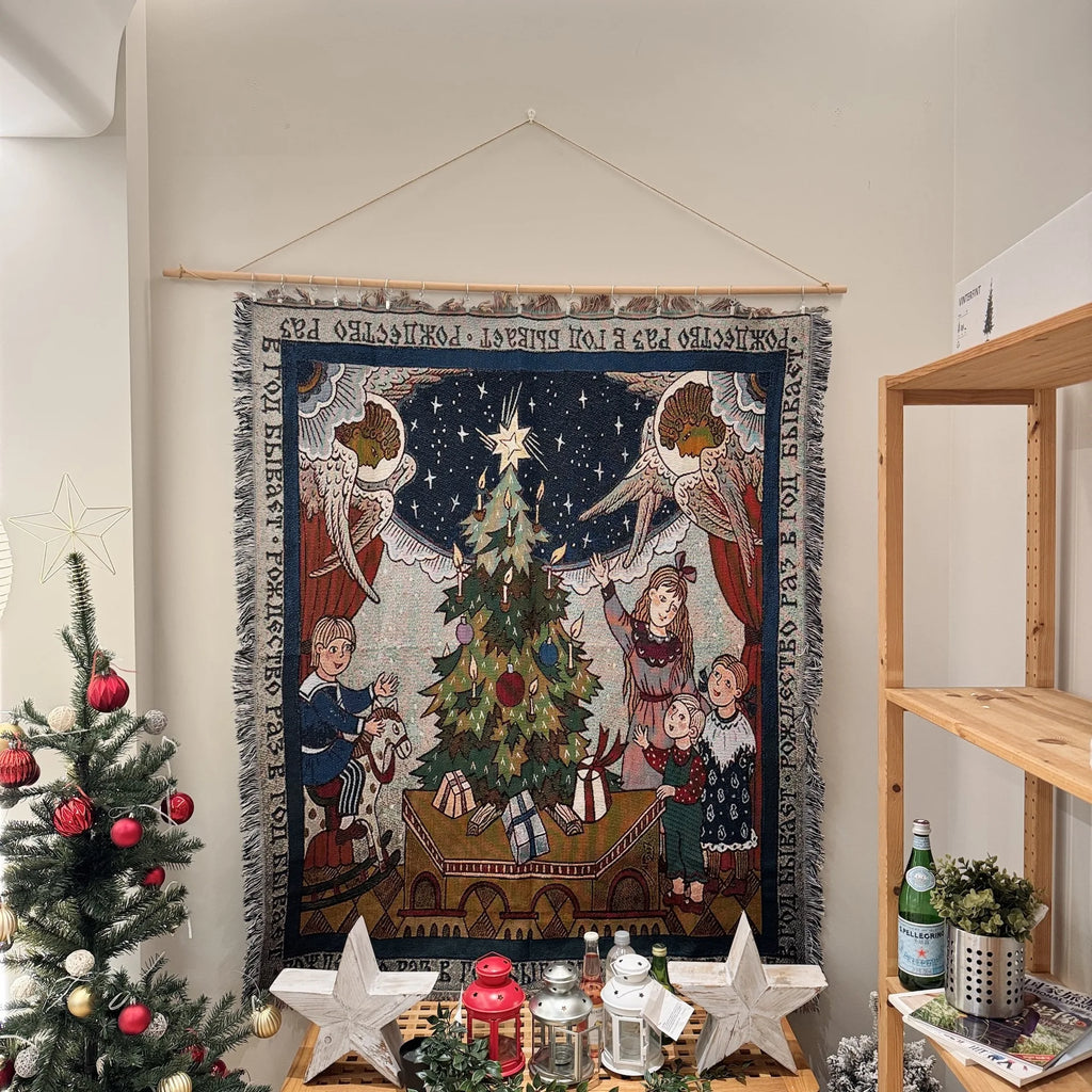 Christmas Angels woven tapestry hanging on a wall