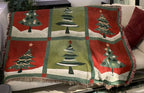 Christmas Tree Patchwork woven tapestry throw blanket on a sofa