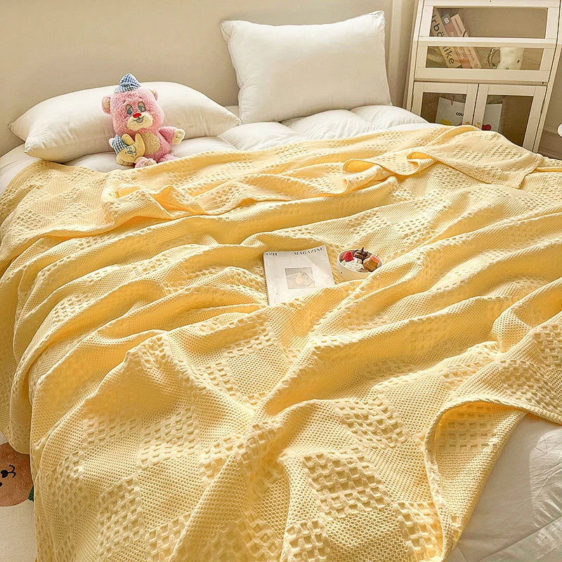 Butter yellow cotton waffle weave blanket close-up
