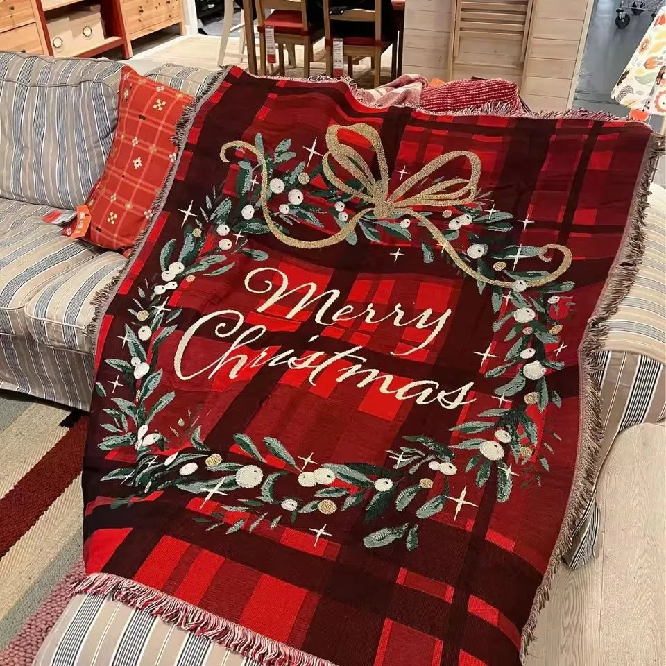 Merry Christmas Plaid woven tapestry throw on a sofa