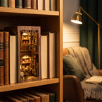 Book nook glowing between books on a bookshelf