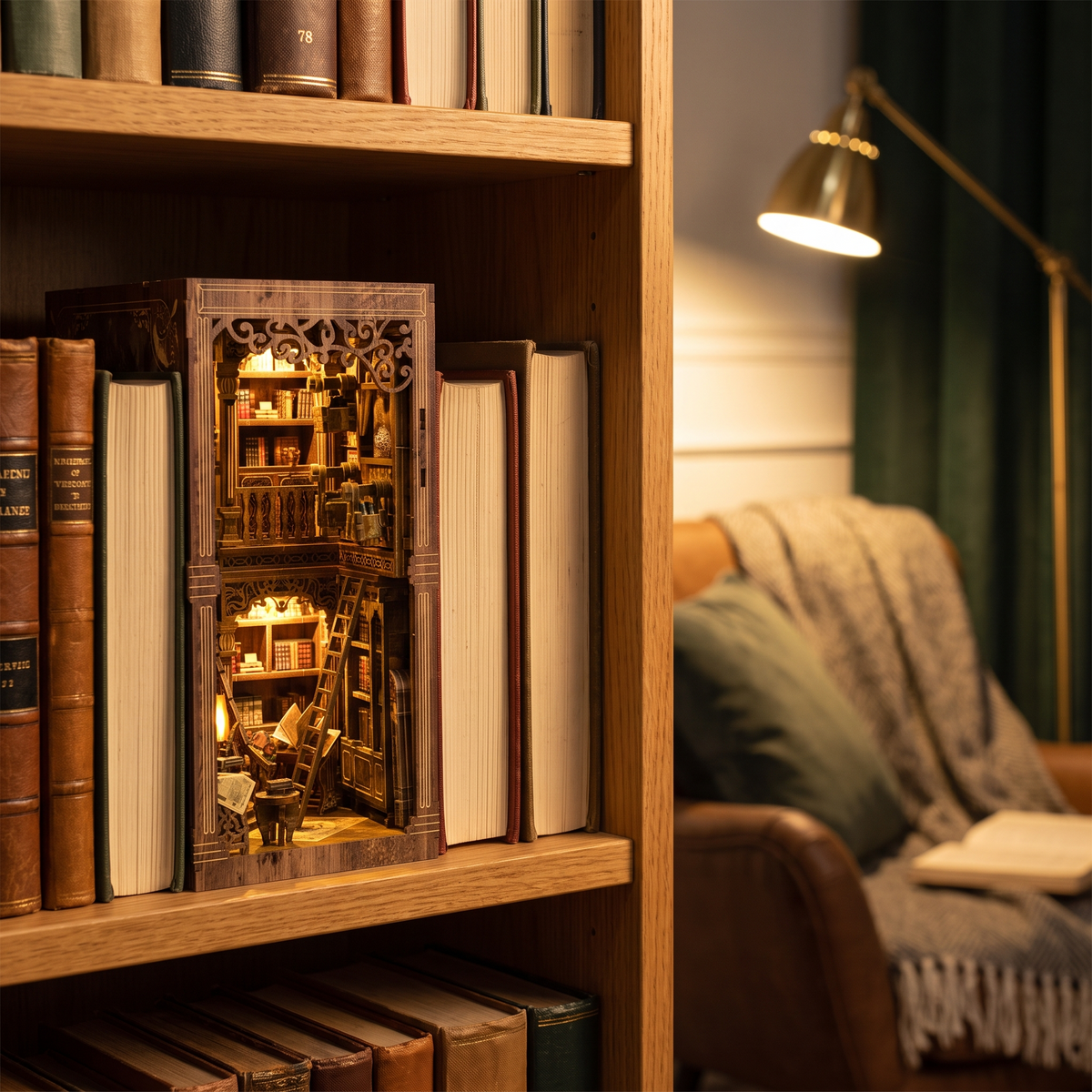 Book nook glowing between books on a bookshelf