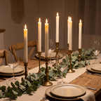 Taper candles on a dinner table