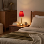 Pleated Cordless Table Lamp on a bedside table