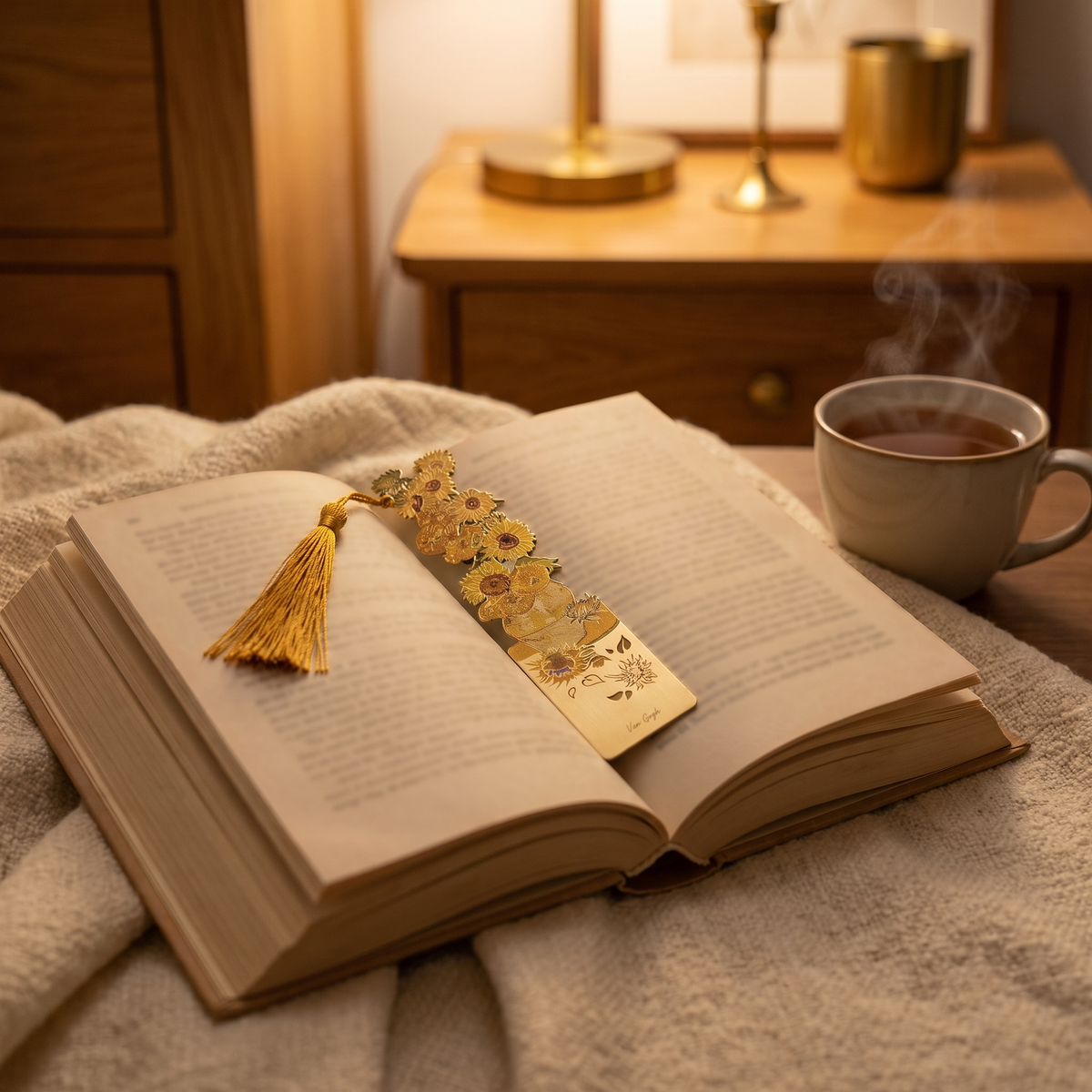 Famous Paintings Brass Bookmark with Tassel in a cozy home