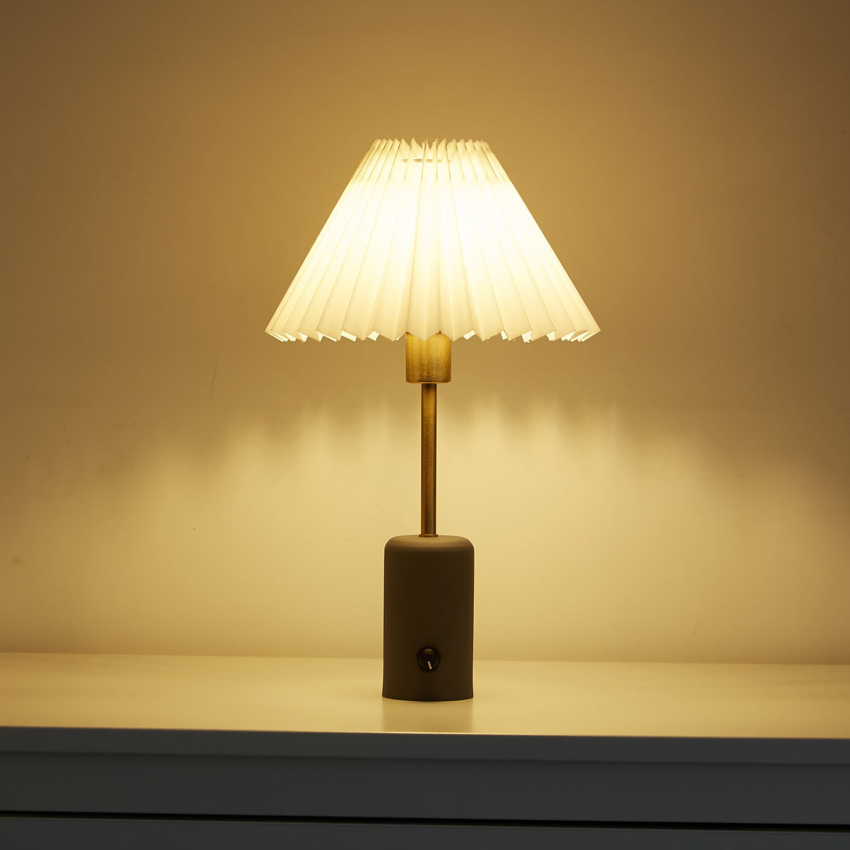 Small Cordless Table Lamp with Gray Base and Pleated Shade